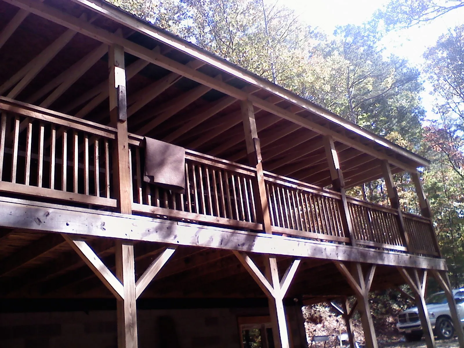 Timber framing under a new elevated porch and deck — Roof Leak Repair in Short Hills by Roofing Brothers